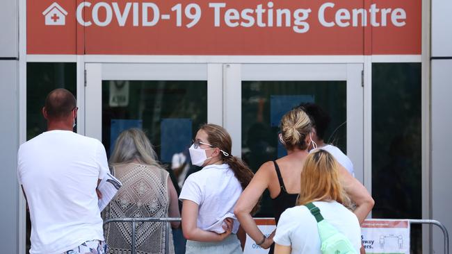 People line up to get tested for COVID-19 at he Gold Coast University Hospital. Picture: Jason O'Brien