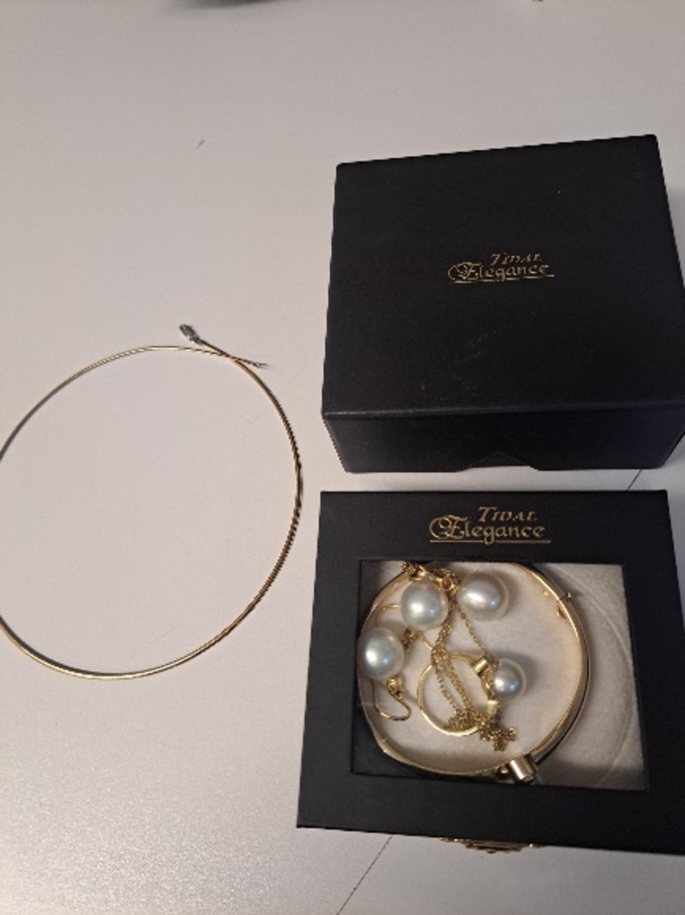 This jewellery set was found in a filing cabinet after a burglary in Toowoomba and believed to have been drop by the offenders in their haste.