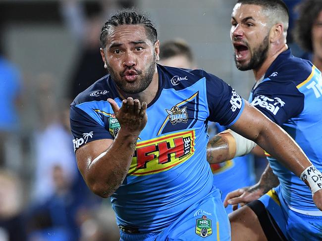 Konrad Hurrell of the Titans reacts after winning try during the Round 1 NRL match between the Gold Coast Titans and the Canberra Raiders at Cbus Super Stadium in Robina on the Gold Coast, Sunday, March 11, 2018. (AAP Image/Dave Hunt) NO ARCHIVING, EDITORIAL USE ONLY