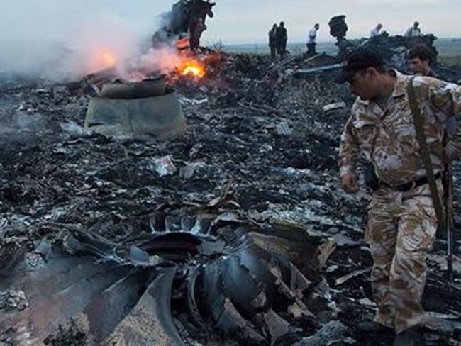 Soldiers at the MH17 site shortly after the crash.