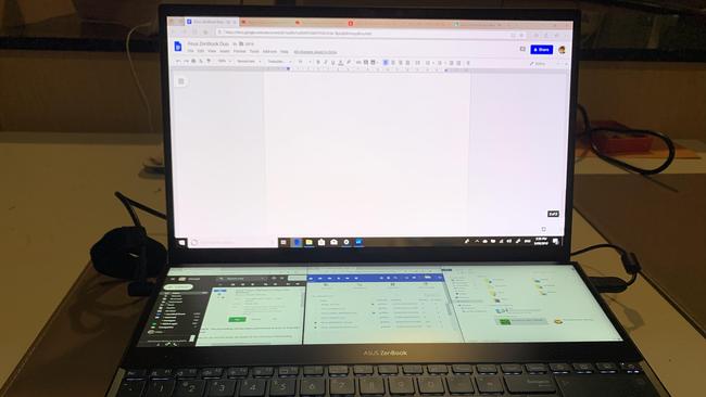 Asus Zenbook Pro Duo showing three smaller browser tabs running on the second screen. Picture: Chris Griffith