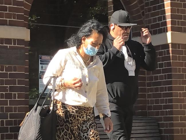 Former NRL star John Hopoate leaves Manly Court House with his wife Rasa Brenda Hopoate, where she was convicted on Wednesday for driving her Mercedes Sprinter van on a suspended licence. Picture: Jim O'Rourke