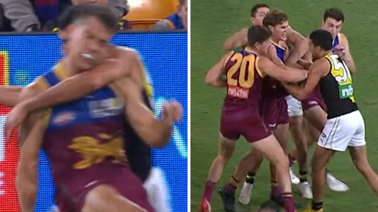 Richmond's Marlion Pickett was reported after this hit on Brisbane's Brandon Starcevich.