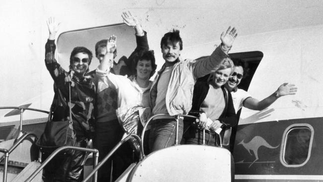 1984: Wills with a tour group about to board a chartered TAA aeroplane from Adelaide Airport bound for P&O Variety Club cruise of the South Pacific, July, 1984.