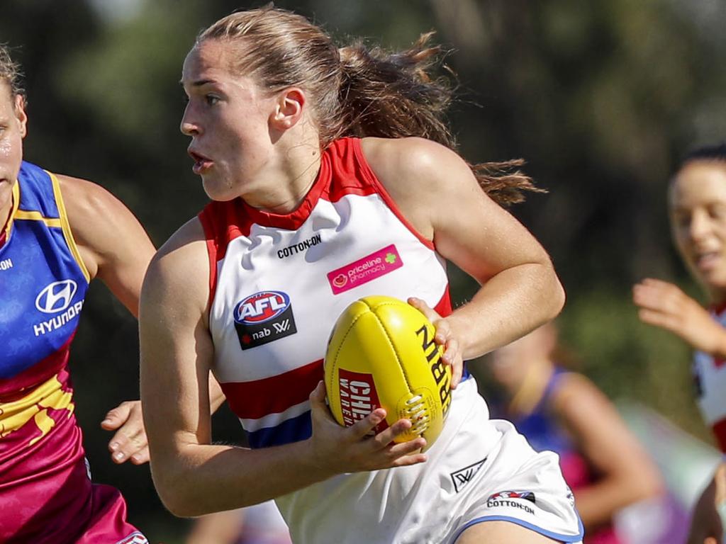 Kate Lutkins (left) of the Lions chases down Isabel Huntington (right) of the Bulldogs during the Round 2 AFLW match between the Brisbane Lions and the Western Bulldogs at the South Pine Sports Complex in Brisbane, Sunday, February 11, 2018. (AAP Image/Glenn Hunt) NO ARCHIVING, EDITORIAL USE ONLY