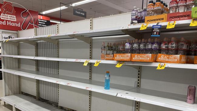 Empty shelves in Coles Supermarket in Newmarket where people have been panic buying ahead of Tropical Cyclone Alfred. Picture: NewsWire/John Gass