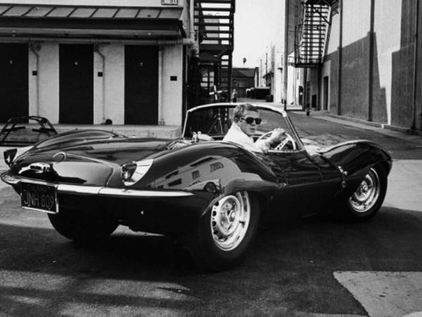 Actor Steve McQueen in his 1956 Jaguar Le Mans motor car.