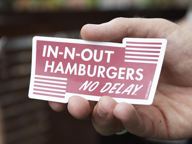 People are lining up for burgers at In-N-Out burger pop-up store at Archive Beer Boutique. 100 Boundary St, West End, Brisbane, 13th of January 2020. (AAP Image/Attila Csaszar)