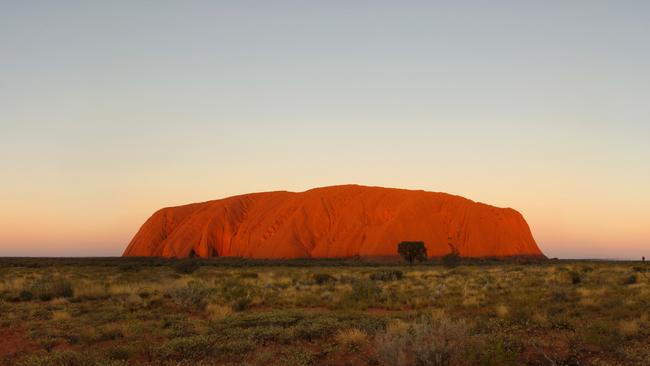 Uluru at dusk, Uluru-Kata Tjuta National Park. Photo: Michael Nelson, Parks Australia