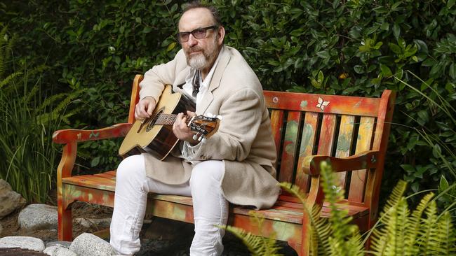 Scottish-born Australian singer-songwriter Colin Hay practises his guitar at his home in Topanga Canyon, California. Picture: Danny Moloshok / The Australian