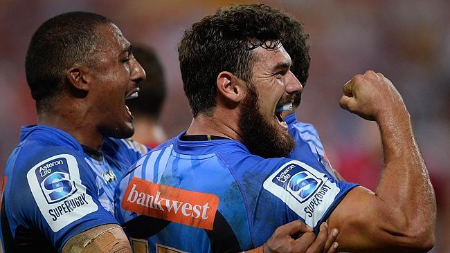 Jayden Hayward celebrates a Force try.