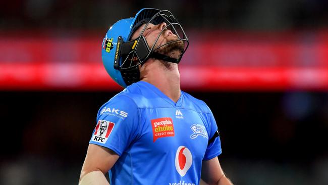 Travis Head of the Strikers reacts after being dismissed during the Big Bash League (BBL) cricket match between the Adelaide Strikers and the Hobart Hurricanes at Adelaide Oval in Adelaide, Sunday, January 26, 2020. (AAP Image/Sam Wundke) NO ARCHIVING, EDITORIAL USE ONLY, IMAGES TO BE USED FOR NEWS REPORTING PURPOSES ONLY, NO COMMERCIAL USE WHATSOEVER, NO USE IN BOOKS WITHOUT PRIOR WRITTEN CONSENT FROM AAP