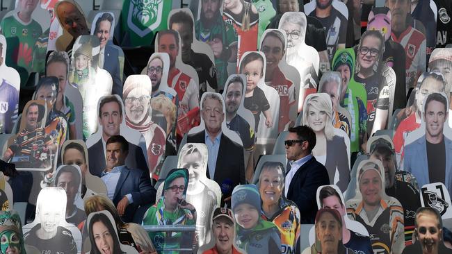 NRL commentators Andrew Johns and Brad Fittler sit among the cardboard cut out crowd ahead of the round three NRL match between the Penrith Panthers and the Newcastle Knights at Campbelltown Stadium in Sydney on May 31. Picture: AAP