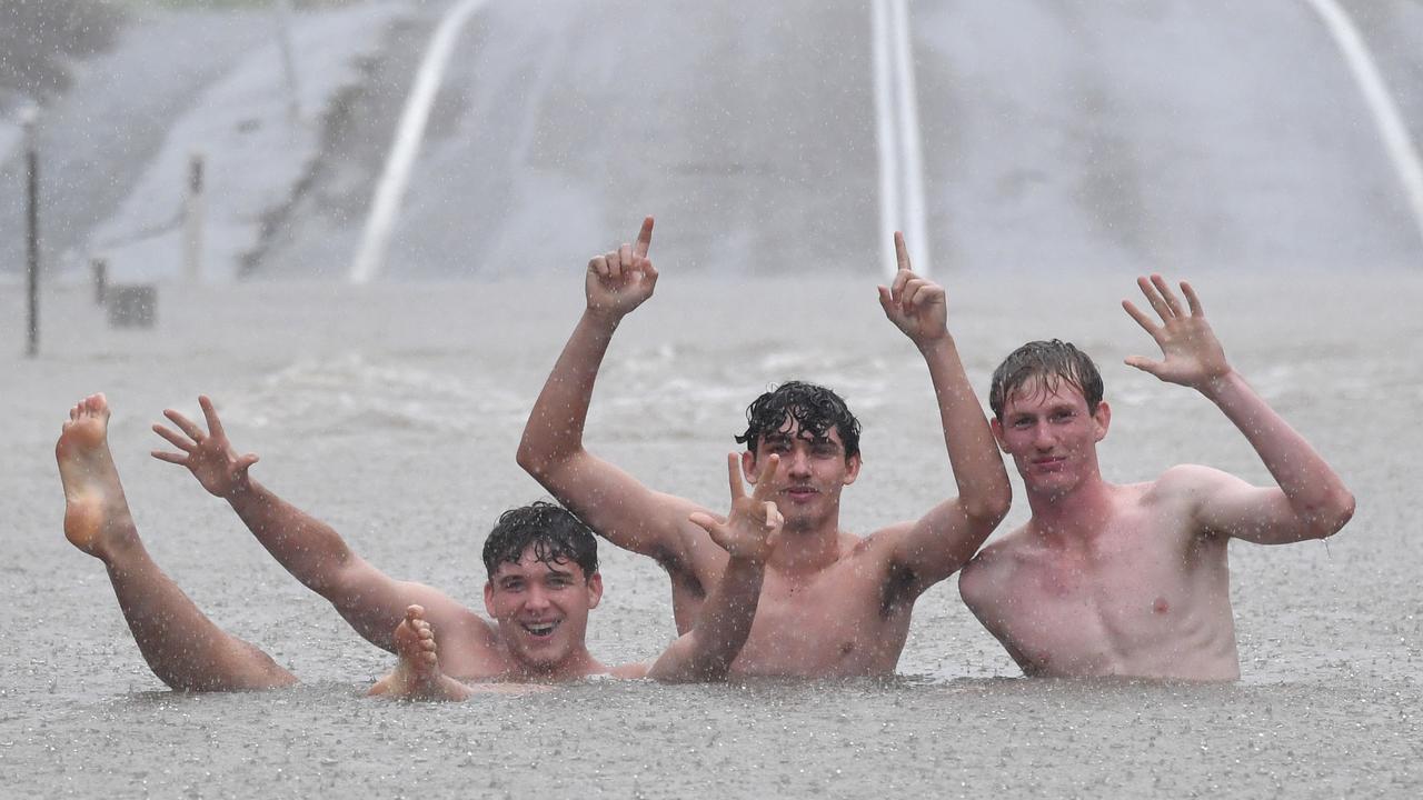 Wet weather in Townsville. Road closed at Allambie Lane, Kelso. Aston Smith, Mitchell Maher and Riley McIntyre. Picture: Evan Morgan