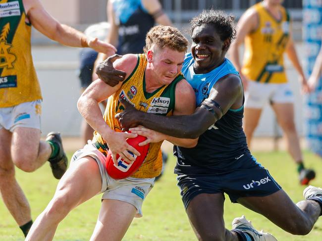 St Mary's Seth Harris is tackled by Antonio James from the Darwin Buffaloes in Round 18 of the 2023-24 NTFL season. Picture: Celina Whan / AFLNT Media