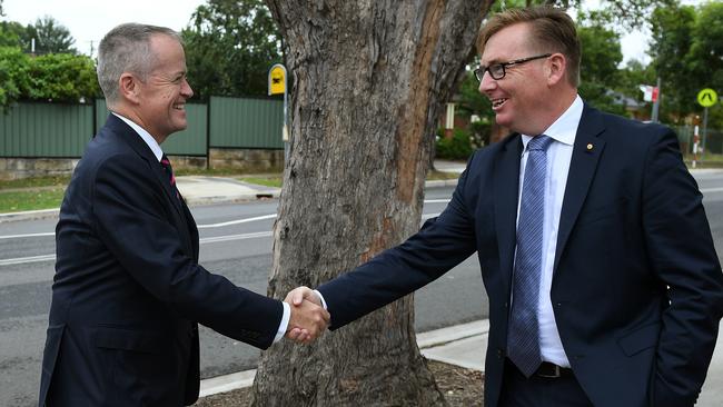 Opposition Leader Bill Shorten is greeted by Labor candidate for Bennelong, Brian Owler. Picture: AAP