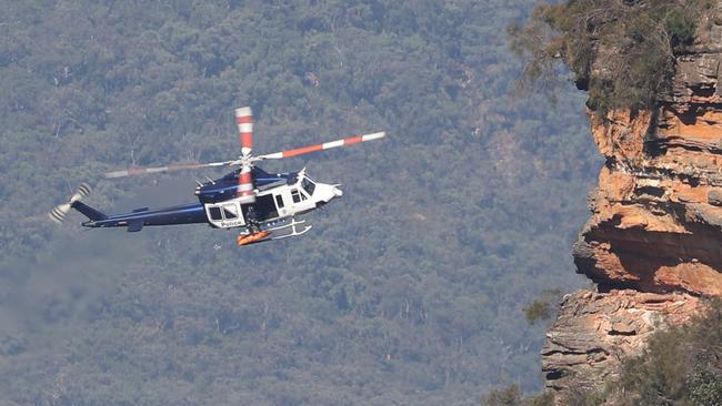 Police mounted a complex operation to retrieve the bodies. Picture John Grainger