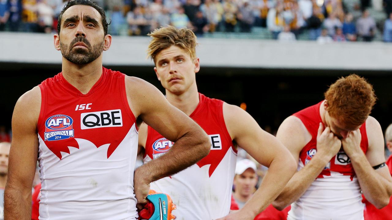 A sombre (from left) Adam Goodes, Dane Rampe and Gary Rohan after the Swans’ 2014 grand final defeat to Hawthorn. Picture: Colleen Petch