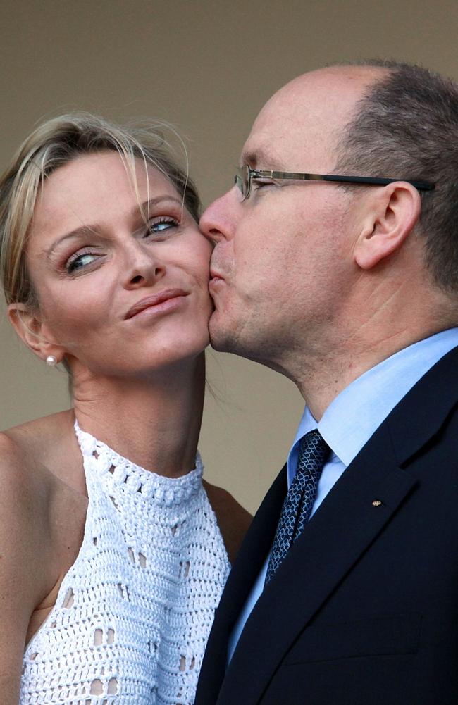 Prince Albert of Monaco kisses Princess Charlene during a meeting with South African President Jacob Zuma on July 6, 2011. Picture: Rajesh Jantilal/AFP