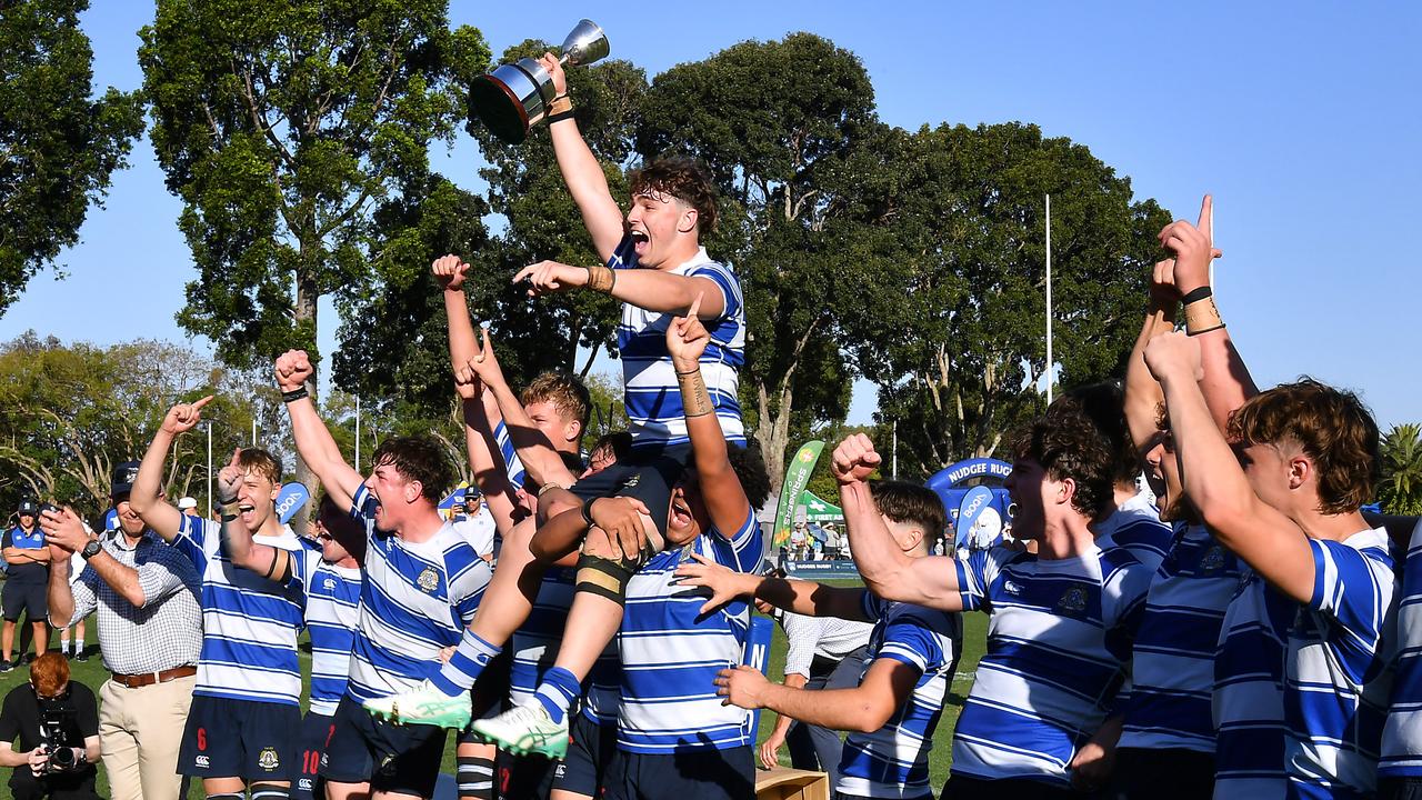 John Grenfell (trophy in hand) celebrating the Nudgee premiership win. Picture: John Gass