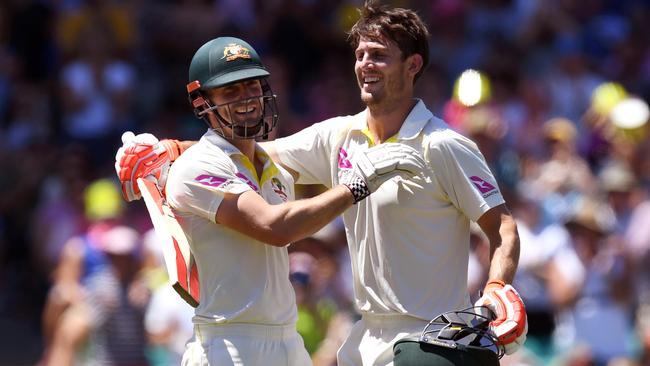 Time to celebrate: both Shaun Marsh (L) and brother Mitchell are both tipped to play in Adelaide. Picture: AFP