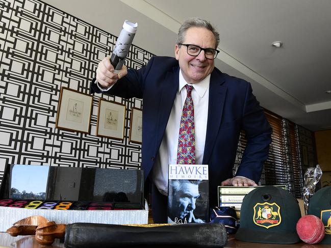 Auctioneer Andrew Shapiro poses for a photograph with items up for auction in the home office of former prime minister Bob Hawke, in Northbridge, Sydney, Wednesday, August 21, 2019. A range of items belonging to Bob Hawke and Blanche D'Alpuget will go to auction on August 27. (Bianca De Marchi)