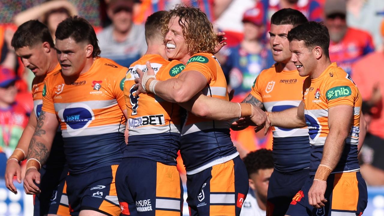 NEWCASTLE, AUSTRALIA - SEPTEMBER 01: Phoenix Crossland of the Knights celebrates scoring a try during the round 26 NRL match between Newcastle Knights and Gold Coast Titans at McDonald Jones Stadium, on September 01, 2024, in Newcastle, Australia. (Photo by Scott Gardiner/Getty Images)