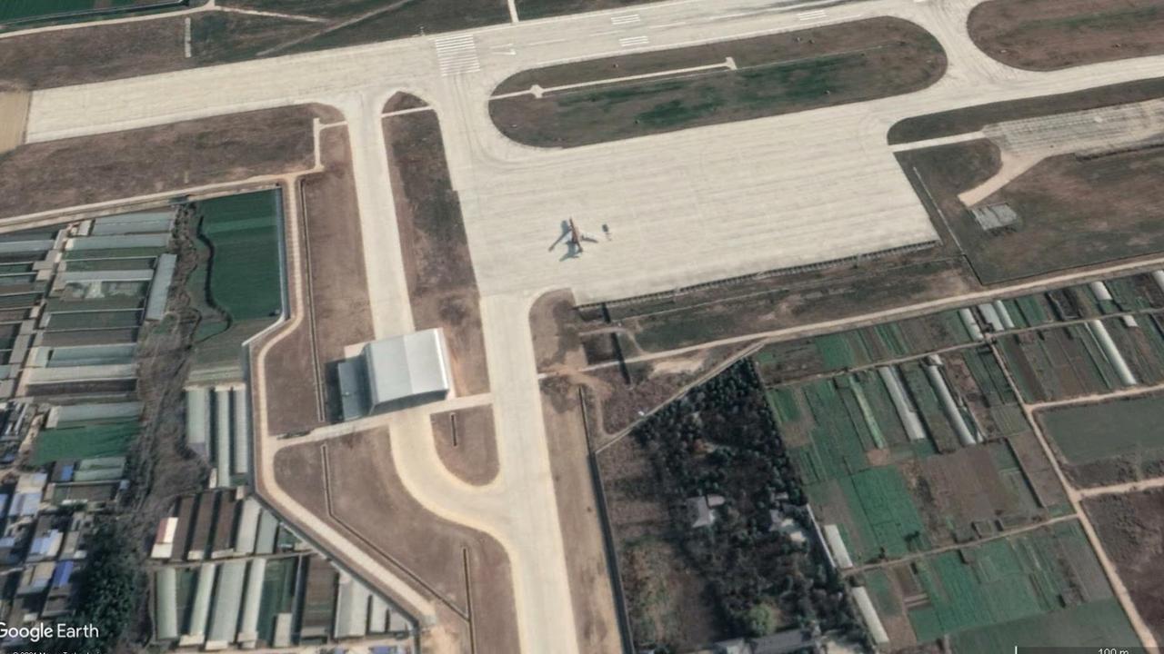 A lone H-6 bomber is seen on a new concrete apron at Neixiang air base.