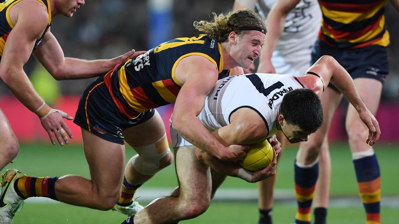 Crow Sam Berry tackles Matthew Kennedy. Picture: Mark Brake/Getty Images