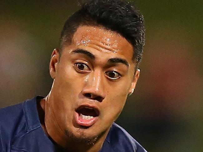 BRISBANE, AUSTRALIA - SEPTEMBER 18: JJ Taulagi of Queensland Country runs the ball during the round five National Rugby Championship match between Queensland Country and the Greater Sydney Rams at Ballymore Stadium on September 18, 2014 in Brisbane, Australia. (Photo by Chris Hyde/Getty Images)