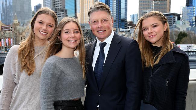 Phoebe Roberts, (right) with dad Michael and sisters Charlotte and Amelia. Picture: Ian Currie