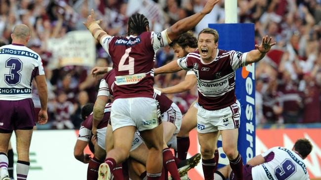 Matt Orford celebrates a try in the 2008 grand final.