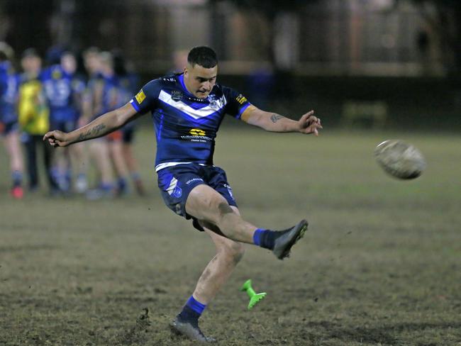 Tomasi Tupou kicks for goal. Picture Warren Gannon Photography