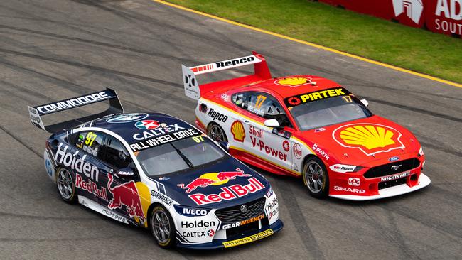 ADELAIDE, AUSTRALIA - MARCH 03: (EDITORS NOTE: A polarizing filter was used for this image.) Shane van Gisbergen drives the #97 Red Bull Holden Racing Team Holden Commodore ZB and Scott McLaughlin drives the #17 Shell V-Power Racing Team Ford Mustang compete at the start of race 2 for the Adelaide 500 Supercars Championship Round at Adelaide Parklands Circuit on March 3, 2019 in Adelaide, Australia. (Photo by Daniel Kalisz/Getty Images)