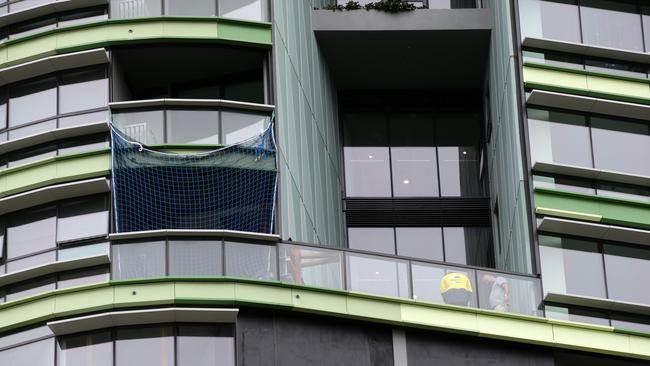 Work been carried out on the tenth floor of the Opal Tower in Sydney Olympic Park. Picture: Jonathan Ng