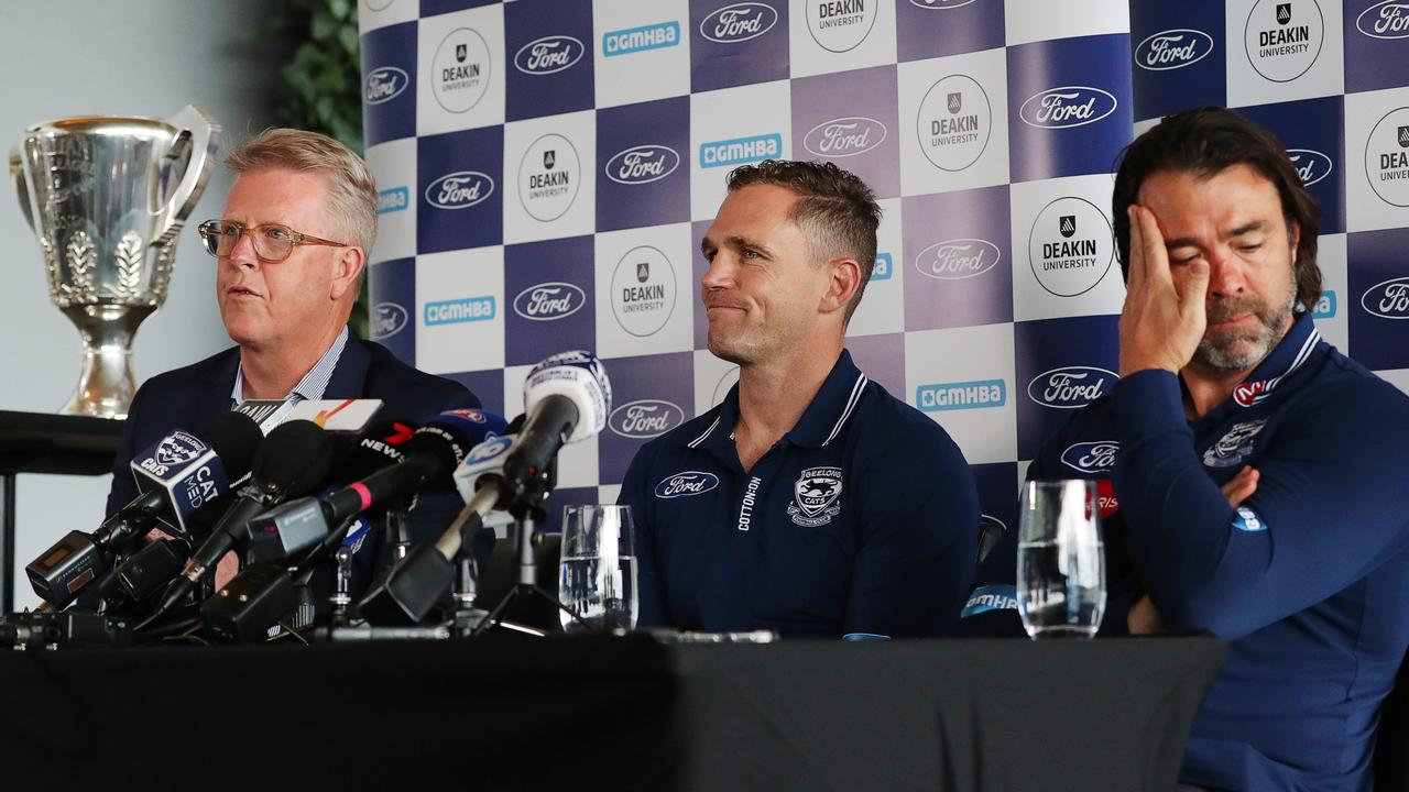 Joel Selwood says it’s over, flanked by Geelong chief executive Steve Hocking and coach Chris Scott. Picture: Alan Barber