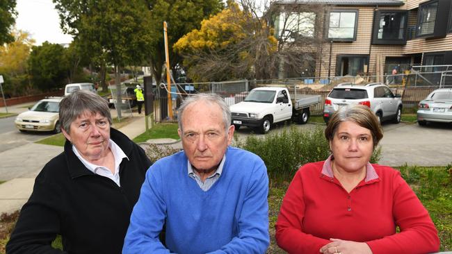 Heather Eadon, Trevor Eddy and Sue Dunn work at the neighbourhood house. Photo: James Ross