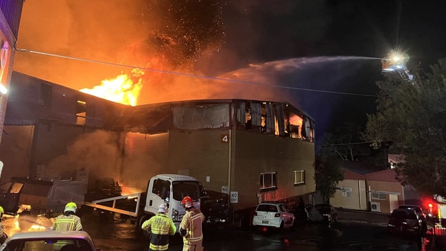 A warehouse fire which is expected to burn “for days” is being treated by police as suspicious. Picture: FRNSW