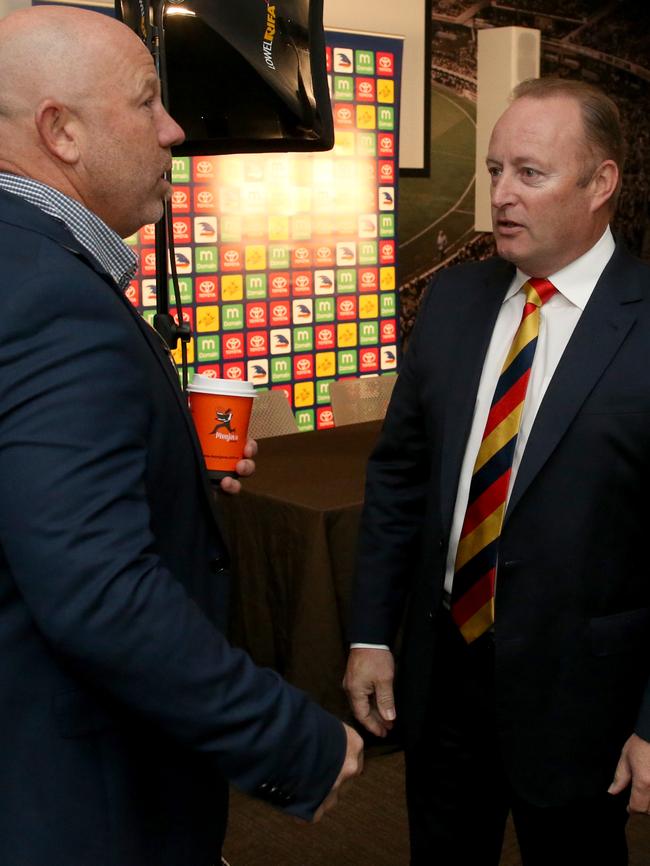 Adelaide Bite boss Nathan Davison with Crows chairman Rob Chapman on Tuesday. Picture: AAP Image/Kelly Barnes