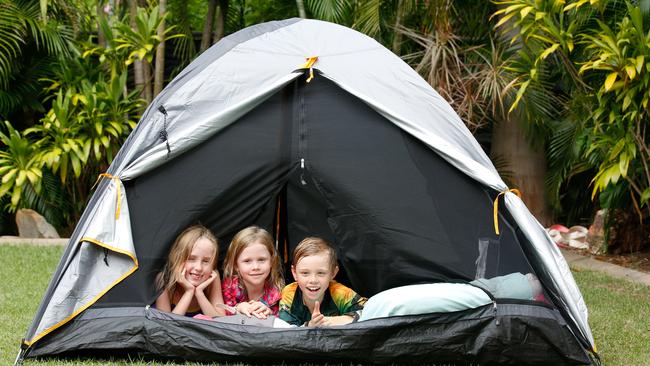 Asha Thexton, 7, Kiera, 6, and Ky Donovan, 8, are looking forward to backyard camping this Easter. Picture: Glenn Campbell