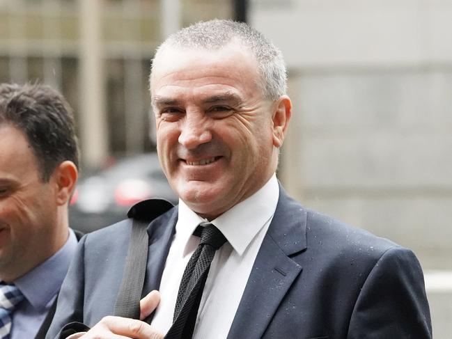 Dover's sole director Terry McMaster (right) arrives at the Federal Court of Australia in Melbourne, Wednesday, June 12, 2019. Dover and its sole director Terry McMaster, who collapsed in the witness box at the banking royal commission last year, are fighting the Australian Securities and Investments Commission's civil penalty action. (AAP Image/Stefan Postles) NO ARCHIVING