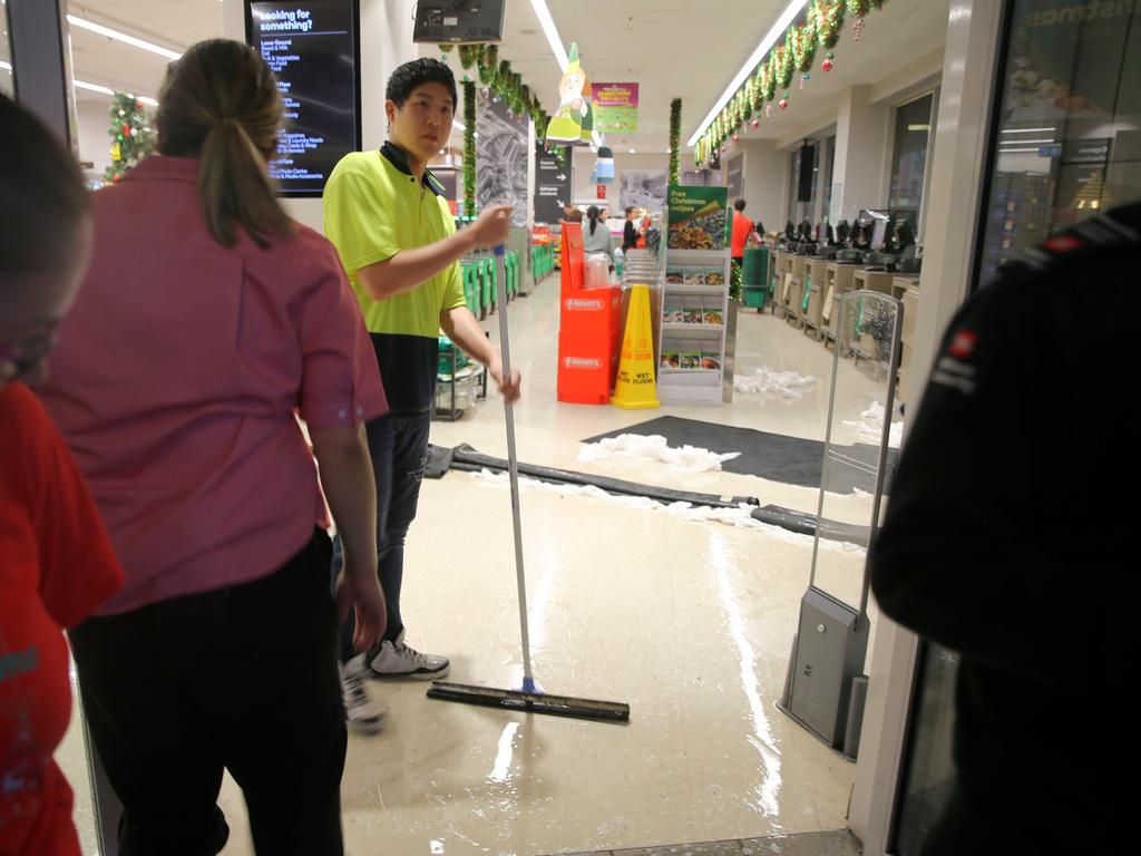 The low hits Sydney at Sunrise . Woolworths at Town hall station is flooding .picture John Grainger