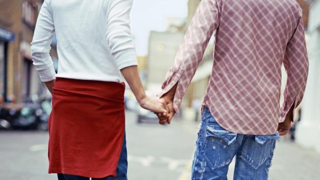 Holding hands in public as a gay couple is a very different story.