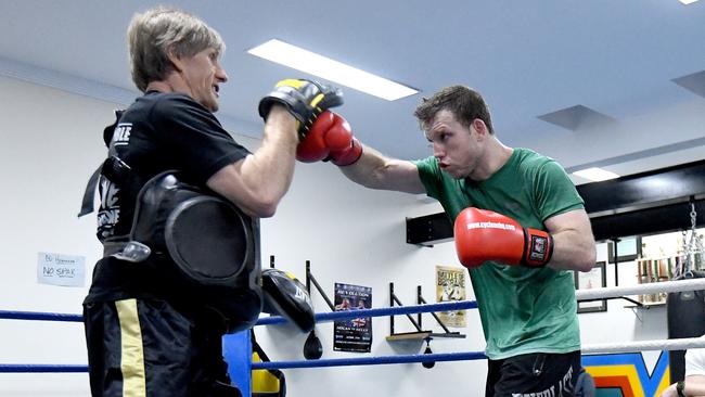 Horn puts the finishing touches on his fight preparation.