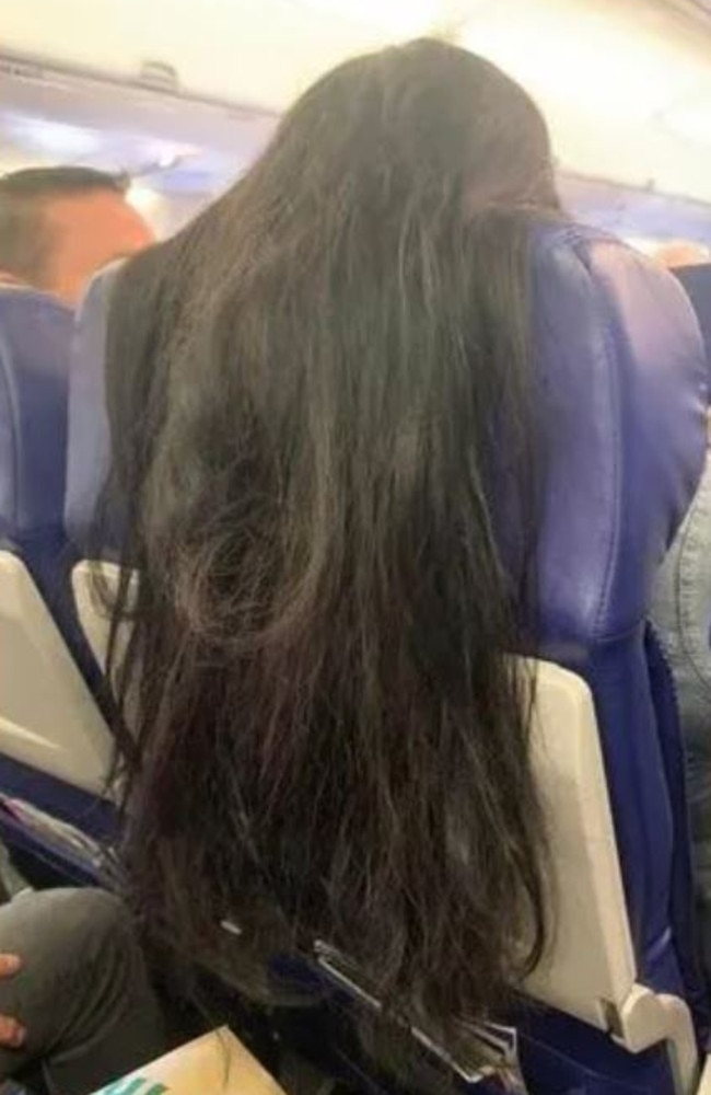 It comes after another sparked outrage when she dropped her hair over a fellow passenger’s chair. Picture: Twitter/@Antman0528