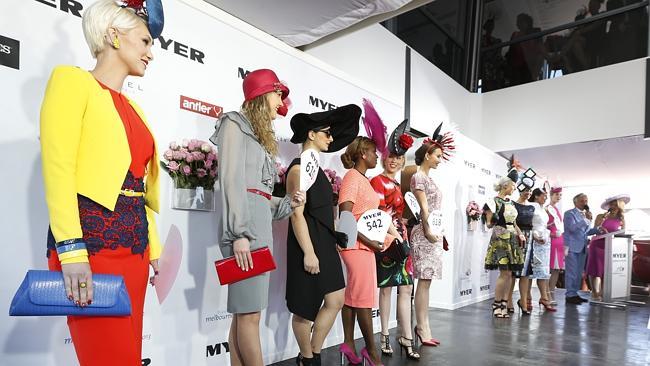 Finalists line up for Women's Racewear judging at the Myer Fashions on the Field competition.