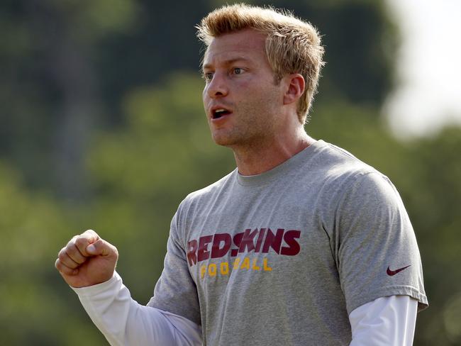 FILE - In this Saturday, July 26, 2014 file photo, Washington Redskins offensive coordinator Sean McVay talks to the offense during practice at the team's NFL football training facility in Richmond, Va. The Los Angeles Rams have made Sean McVay the youngest head coach in NFL history. The Rams on Thursday, Jan. 12, 2017, hired McVay, who turns 31 years old on Jan. 24. (AP Photo, File)