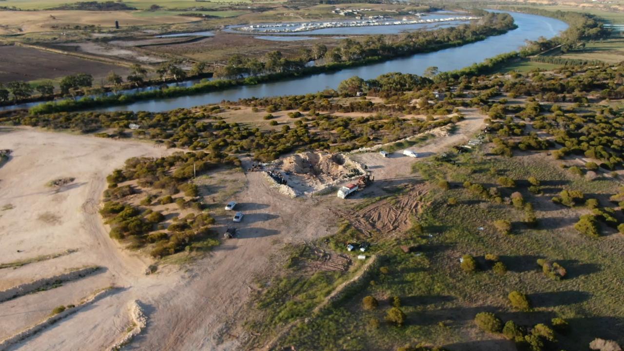 Drone shots from the discovery of the car remains at Ponde Hell Angels property during the search for evidence in two murder cases. Picture: Nine News