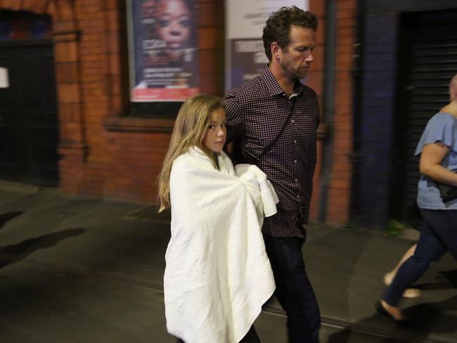 Police escort members of the public from the Manchester Arena. Picture: Getty