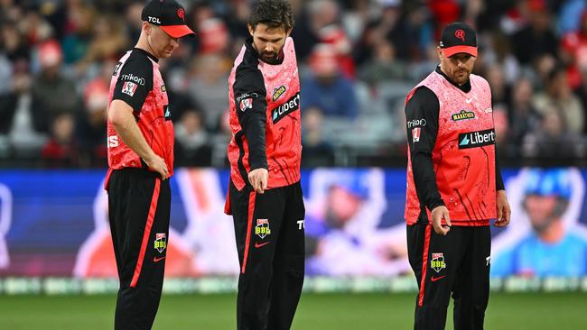 Melbourne Renegades players, including Aaron Finch (right), inspect the GMHBA Stadium pitch on December 10, 2023. Picture: Quinn Rooney/Getty Images.